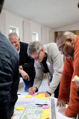 Board of Directors members, discussing